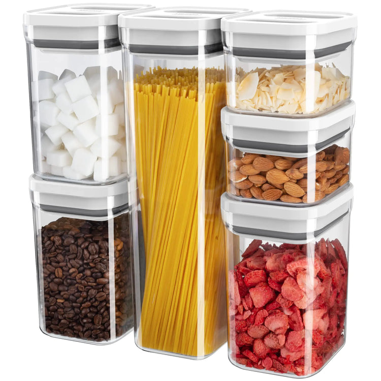 Set of clear storage containers with lids, each filled with different food items on a white background.
