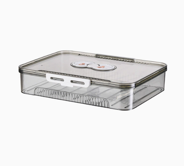 Clear storage bin with a white handle on a white background